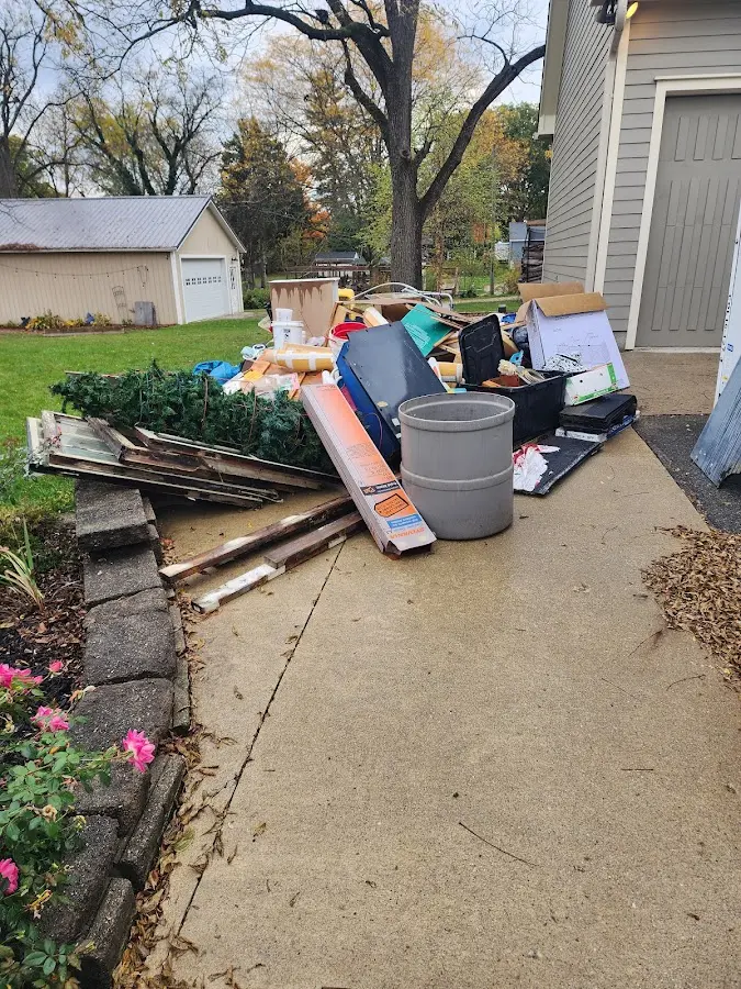 Dumpster being loaded with debris for 30 Yard Dumpster Rental in Beekman